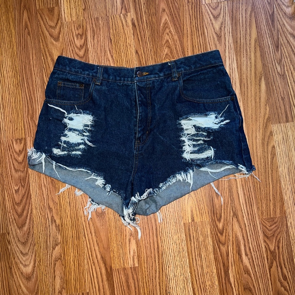 Distressed cutoff denim shorts